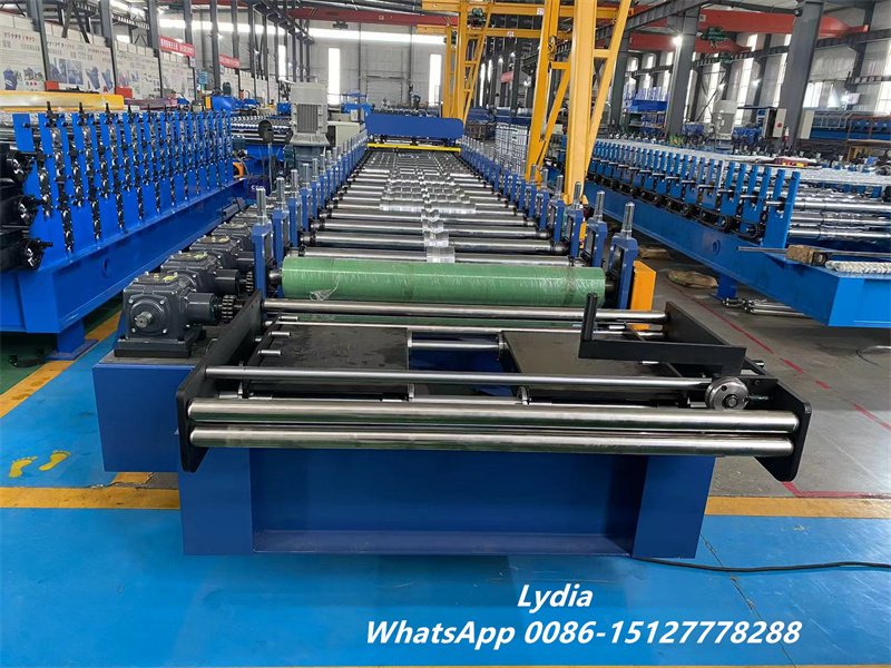 Metal roof panel forming machine