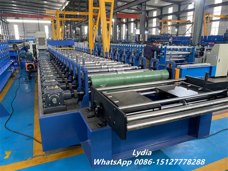 Metal roof panel forming machine