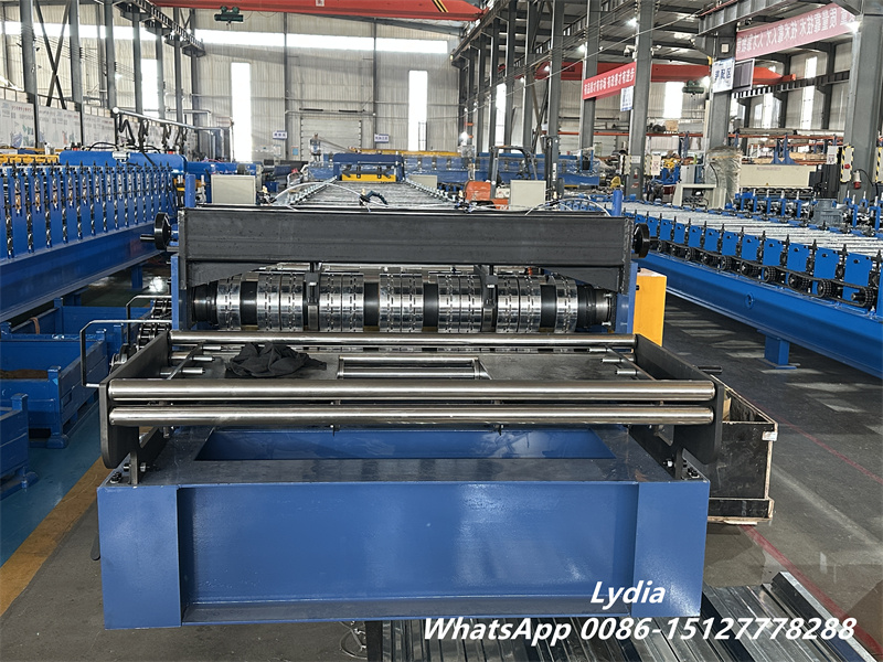 Rolled-in embossments on composite floor deck for mechanical interlock with concrete