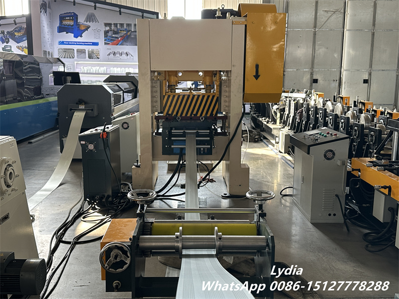 Coil fed metal perforation machine with automatic recoiler system