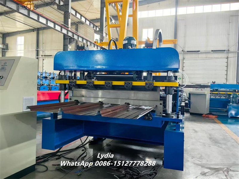 Roofing sheet roll forming process in factory workshop