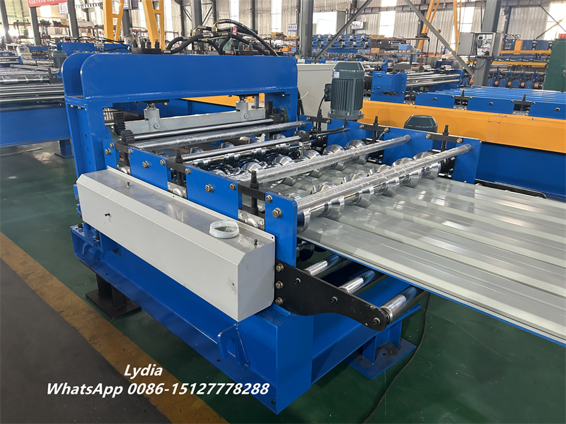 Metal roof panel arch forming machine