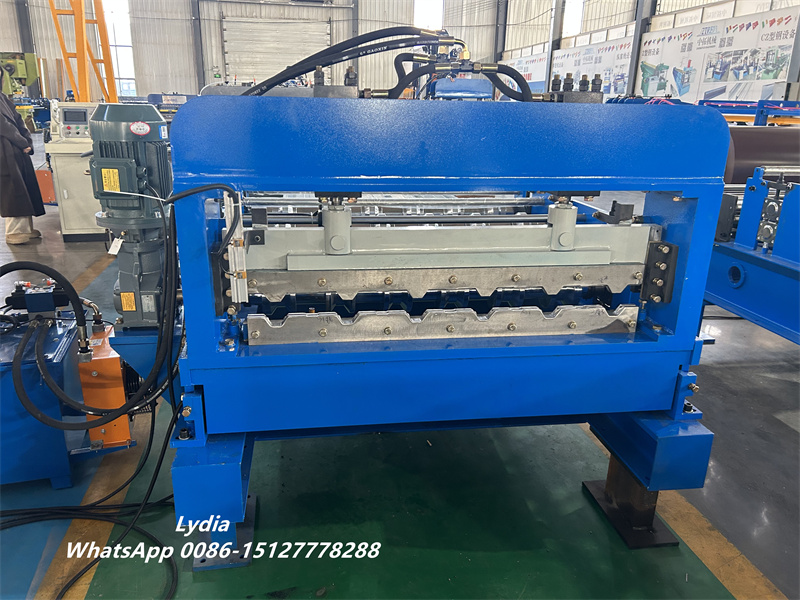 Arch cambering machine for metal roofing panels