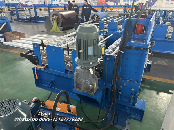 Arch cambering machine for metal roofing panels