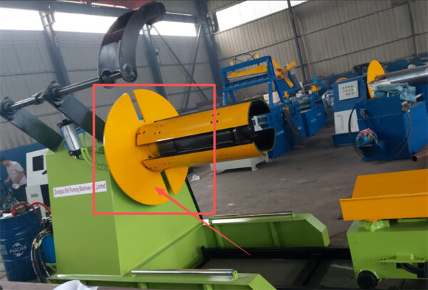 Decoiler10 hydraulic decoiler feeding steel coil into roll forming machine