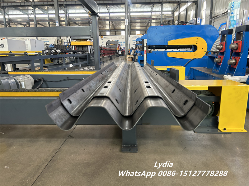 highway guardrail punching system