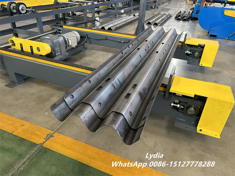 highway guardrail punching system