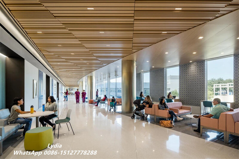 Omega linear metal ceiling baffles installed in a modern interior